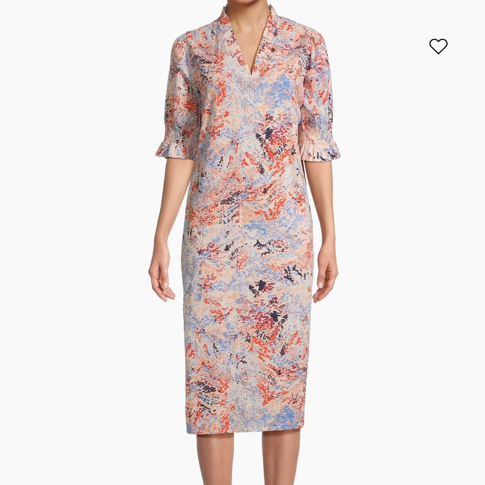 Crafted of seersucker cotton, the Nydela midi-dress from Masai Copenhagen
